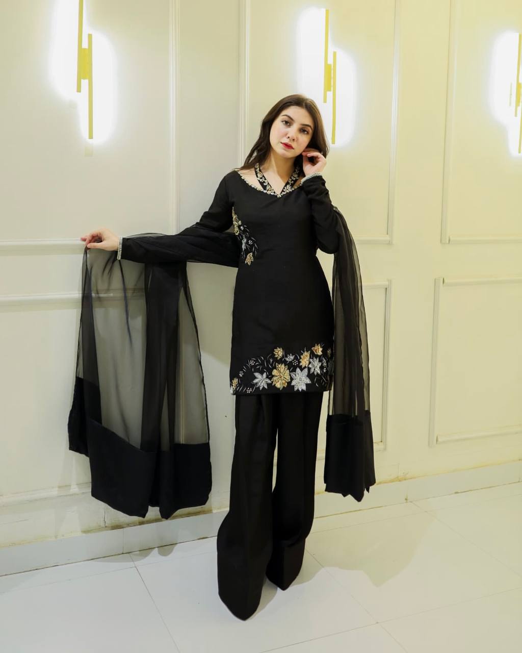 Elegance in Black: A Captivating Pose of Timeless Beauty