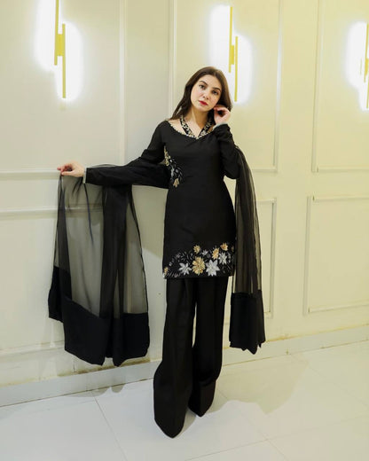 Elegance in Black: A Captivating Pose of Timeless Beauty