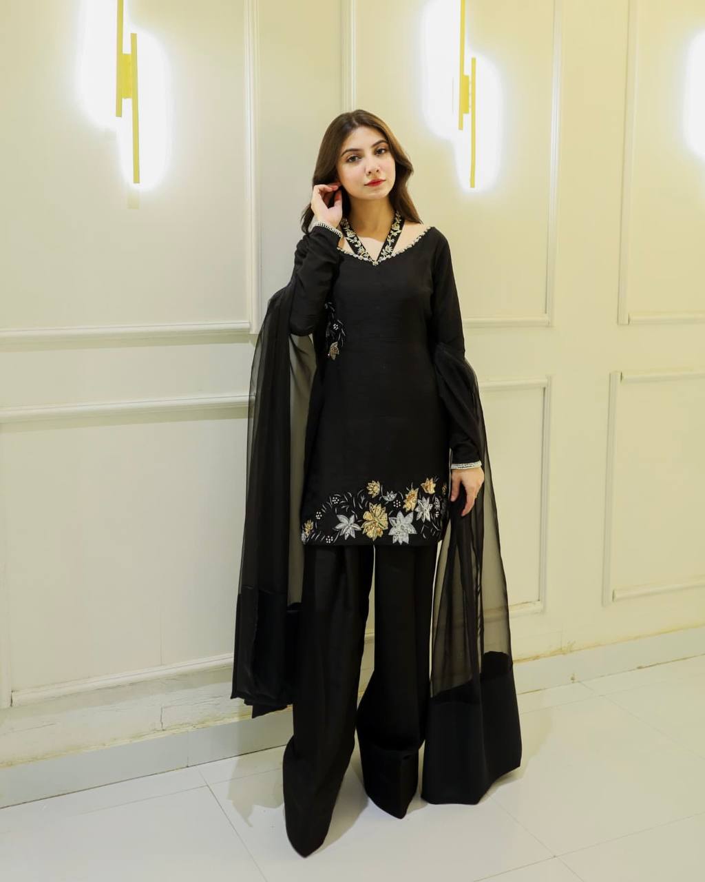 Elegance in Black: A Captivating Pose of Timeless Beauty
