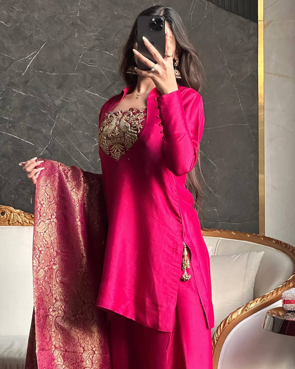 A Vision of Confidence in a Stylish Pink Suit
